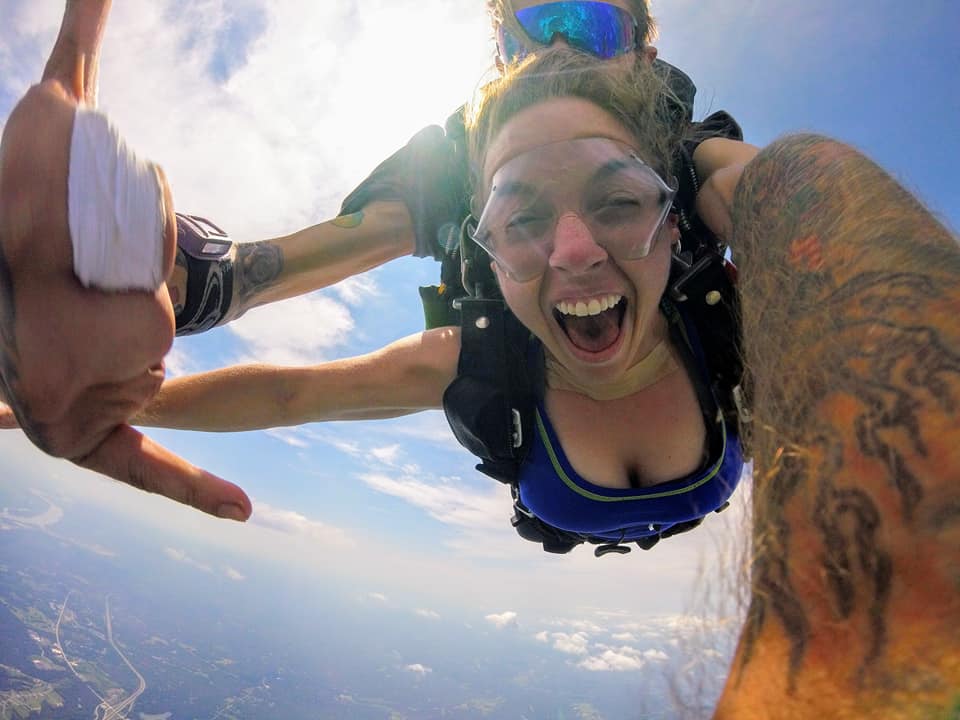 Woman looking good in a skydive photo while wearing goggles at Skydive St Louis near Chicago