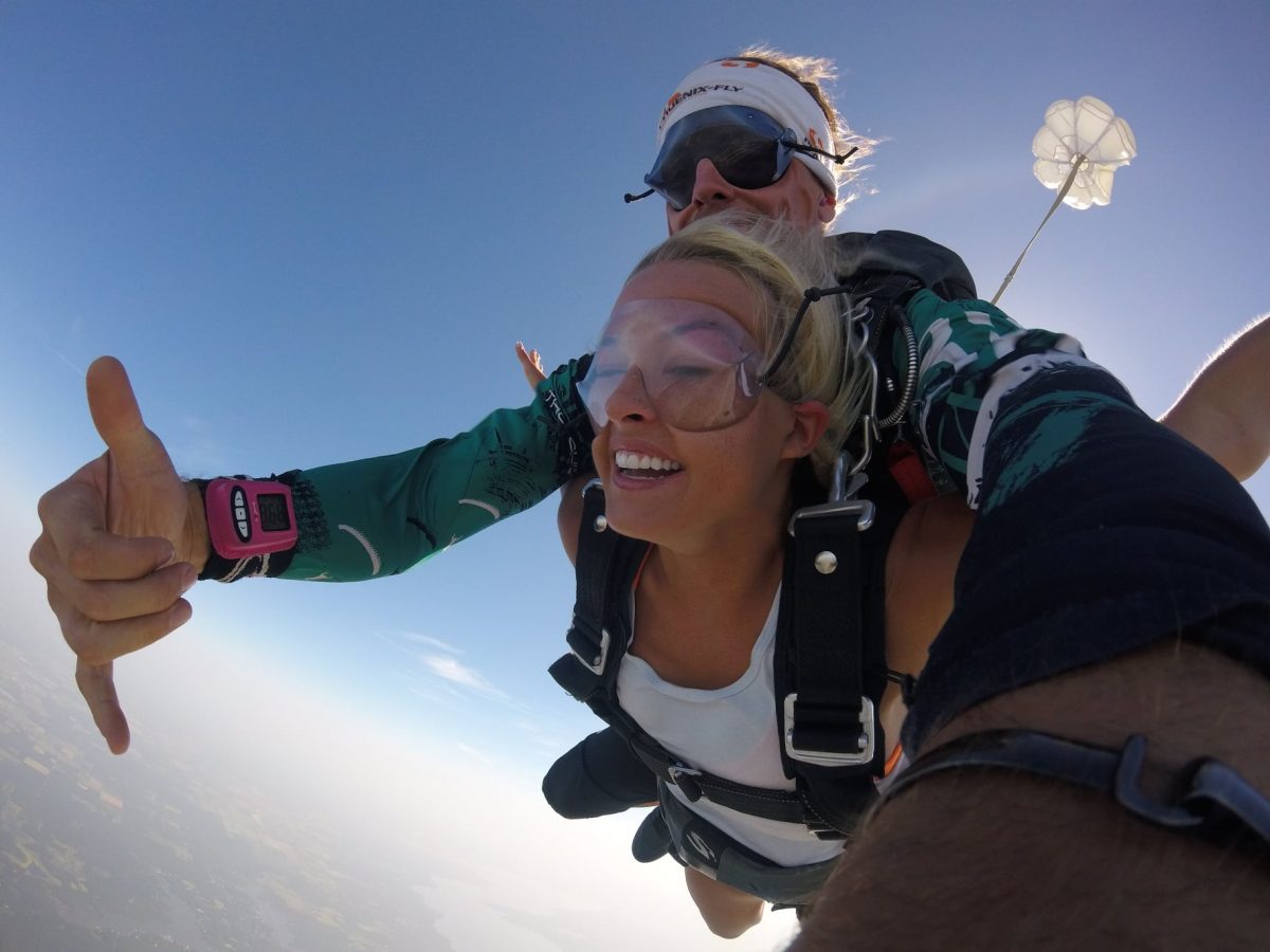 Woman smiling while tandem skydiving at Skydive St Louis in Missouri